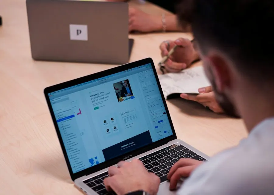Person working on a website on a laptop